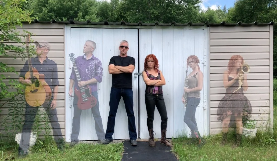 The Red Dirt Skinners duo standing in front of a white shed, arms crossed, with ghostly images of themselves playing various instruments, symbolizing their multi-instrumental talents.