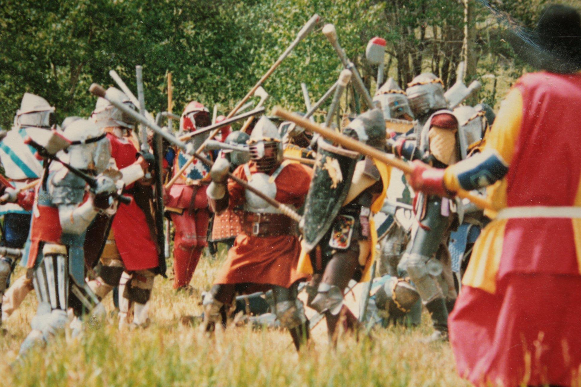 Armored fighters engaged in heavy medieval combat during Clinton War.